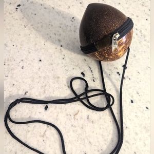 Jamaican coconut necklace container 🥥